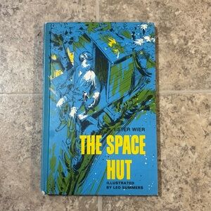 Vintage 1967 Hardback Copy of Weekly Reader "The Space Hut" by Ester Wier.In EUC